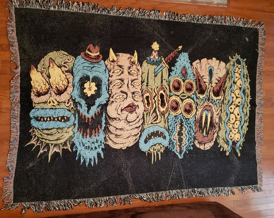 7 Monster Heads in a Row Blanket